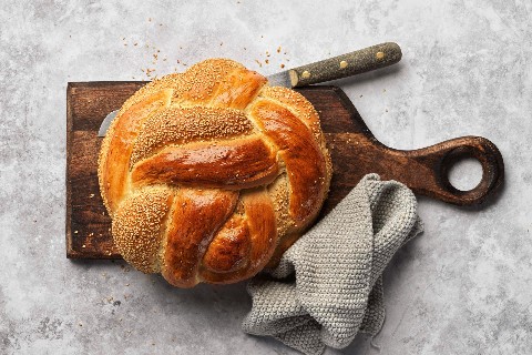 Round sesame Zopf loaf