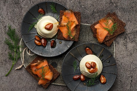 Sour cream mousse with honey-roasted almonds