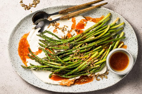 Harissa asparagus on labneh