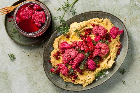 Pickled cauliflower on hummus