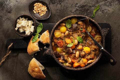 Aubergines with tomatoes and white beans