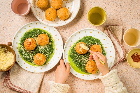 Knödel di patate con spinaci alla panna