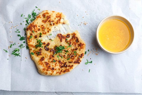 Cheesy naan with garlic butter