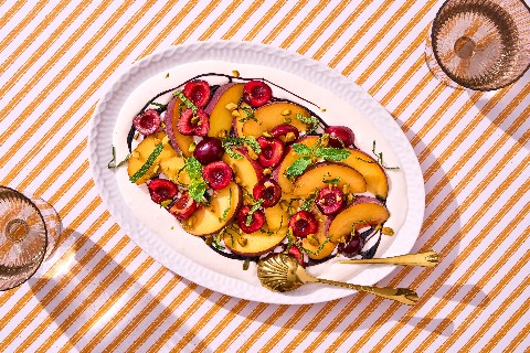 Peach salad on creamy burrata